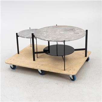 2 coffee tables with frames in powder-coated steel and removable tabletops in grey marble. Labelled. Coffee table with magazine shelf - Dennis Marquart