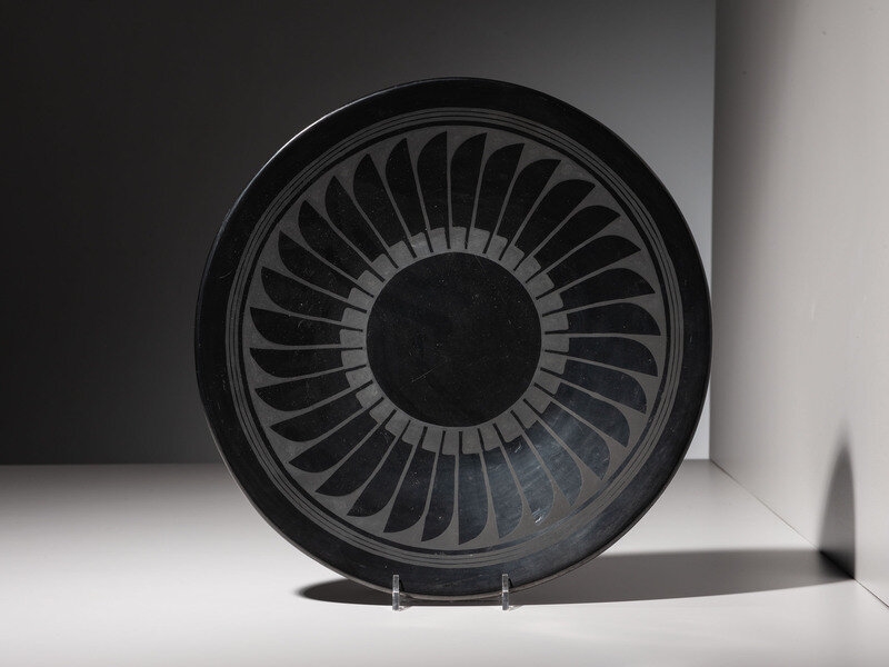 Artwork by Maria Montoya Martinez, Santana Roybal Martinez, Maria and Santana Martinez
(San Ildefonso, 1887-1980 / 1909-2002)
Blackware Pottery Repeating Feather Plate1943-1956, Made of Blackware pottery