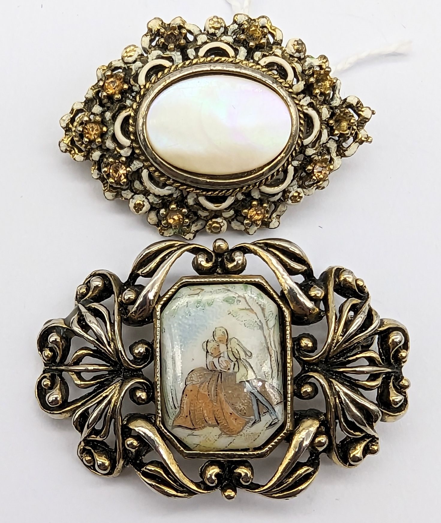 Artwork by Elizabeth Reimer, ARCANSAS BROOCHES, Made of white enamel