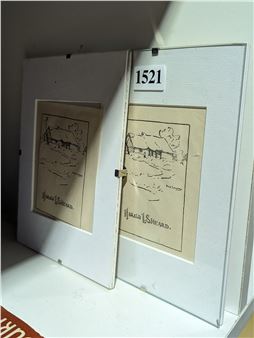 A display of two framed sketches featuring a rustic house and trees, presented in an auction-style setting.