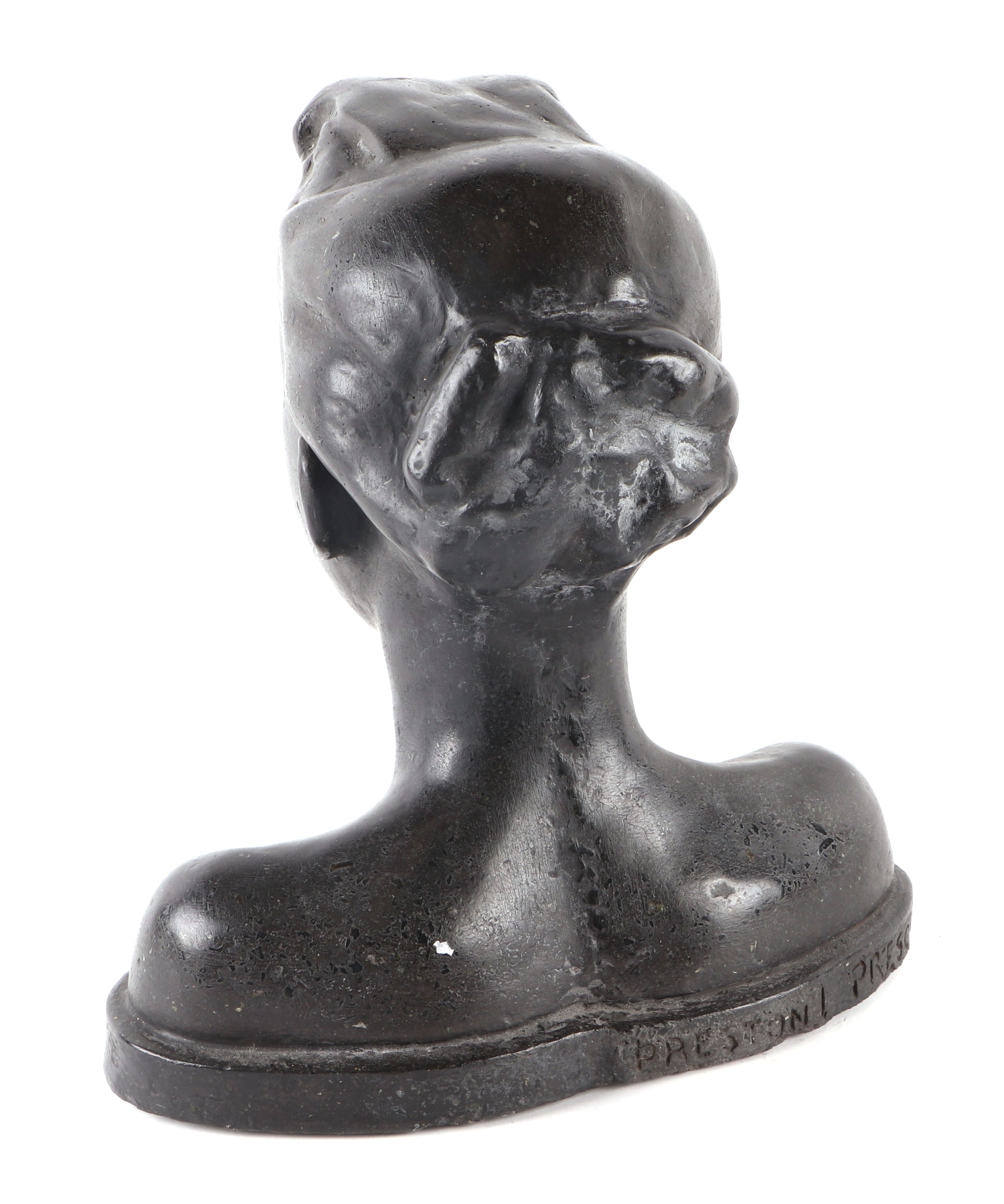 Artwork by Preston L. Prescott, - a polished stone sculpture depicting the head and shoulder bust of a young negro woman, Made of polished stone sculpture