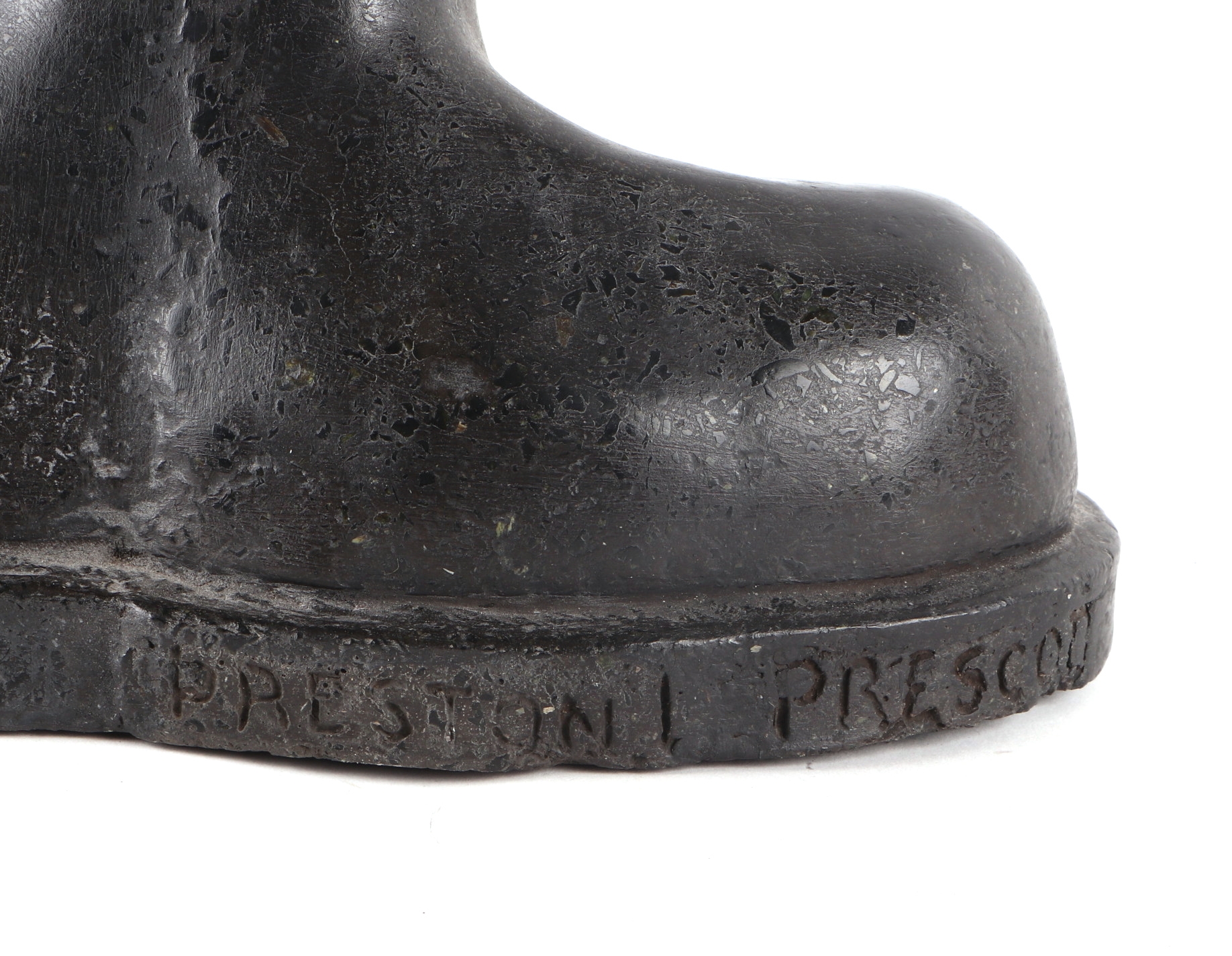 Artwork by Preston L. Prescott, - a polished stone sculpture depicting the head and shoulder bust of a young negro woman, Made of polished stone sculpture