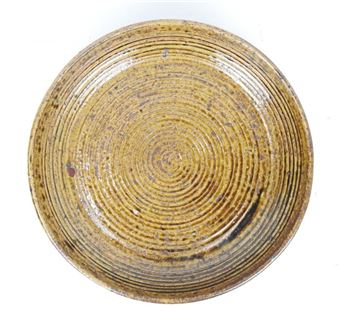 Large circular stoneware dish glazed with vegetable ash - André Bodin