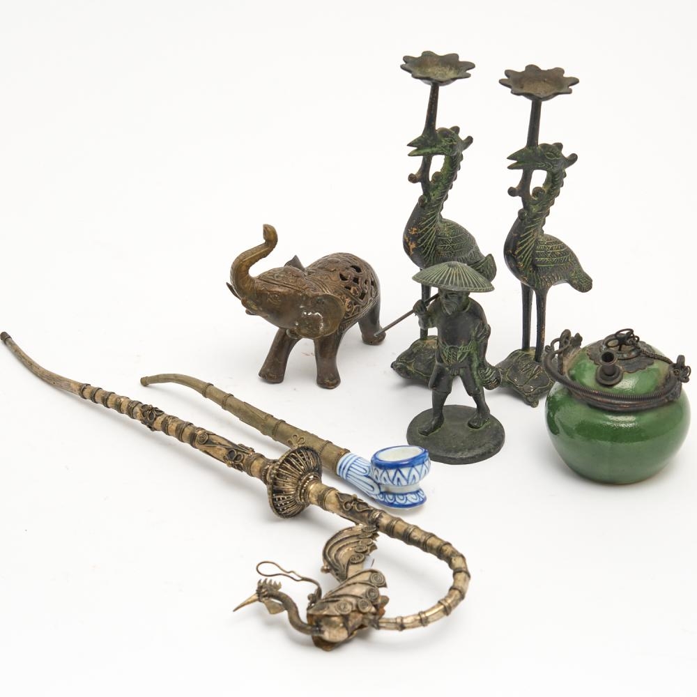 An Elephant | A GROUP OF CAST METAL OBJECTS INCLUDING A PAIR OF STORK ...