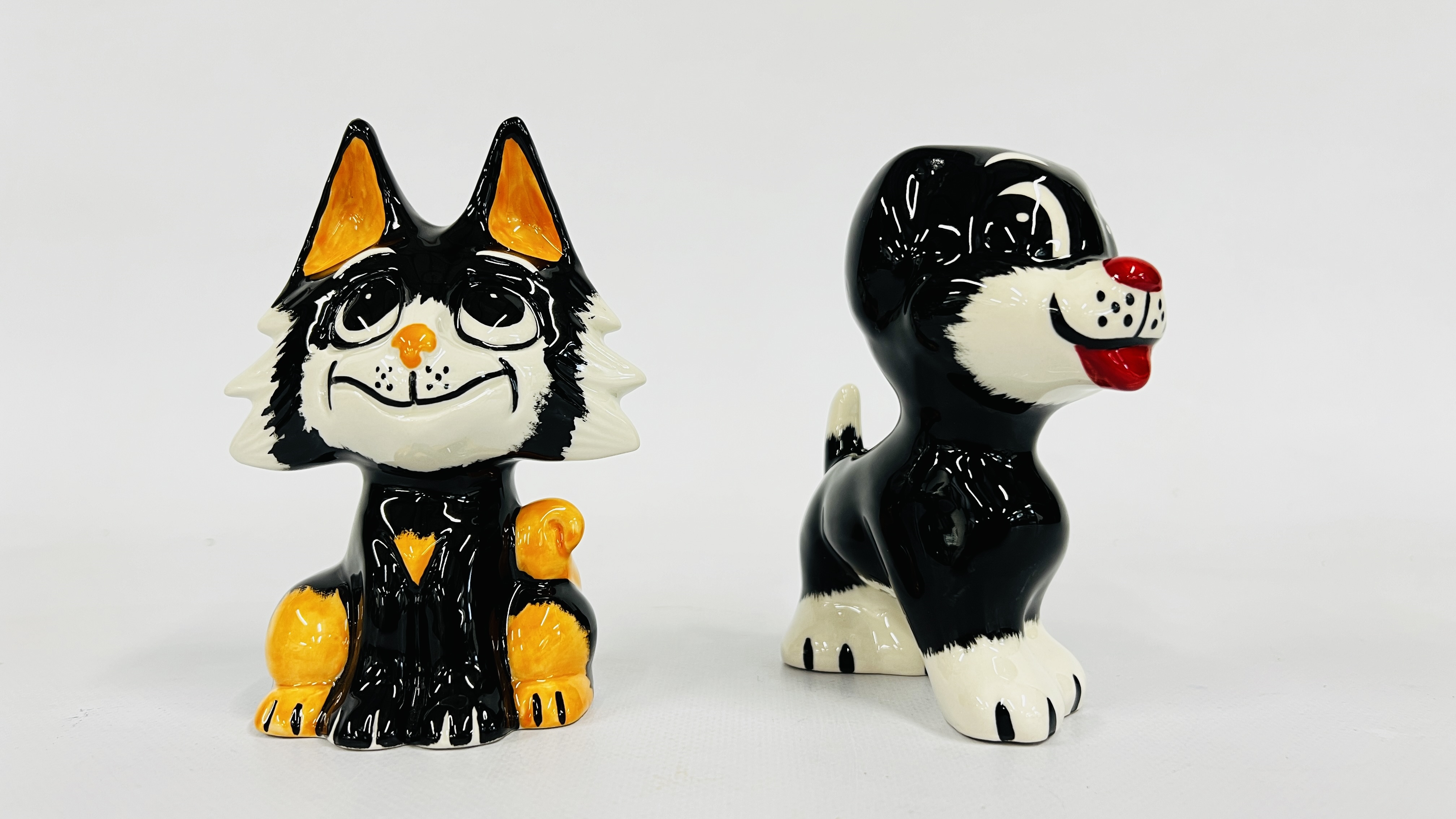Artwork by Lorna Bailey, TWO LORNA BAILEY ORNAMENTS TO INCLUDE A CAT AND DOG BEARING SIGNATURE H 12CM + H 13CM