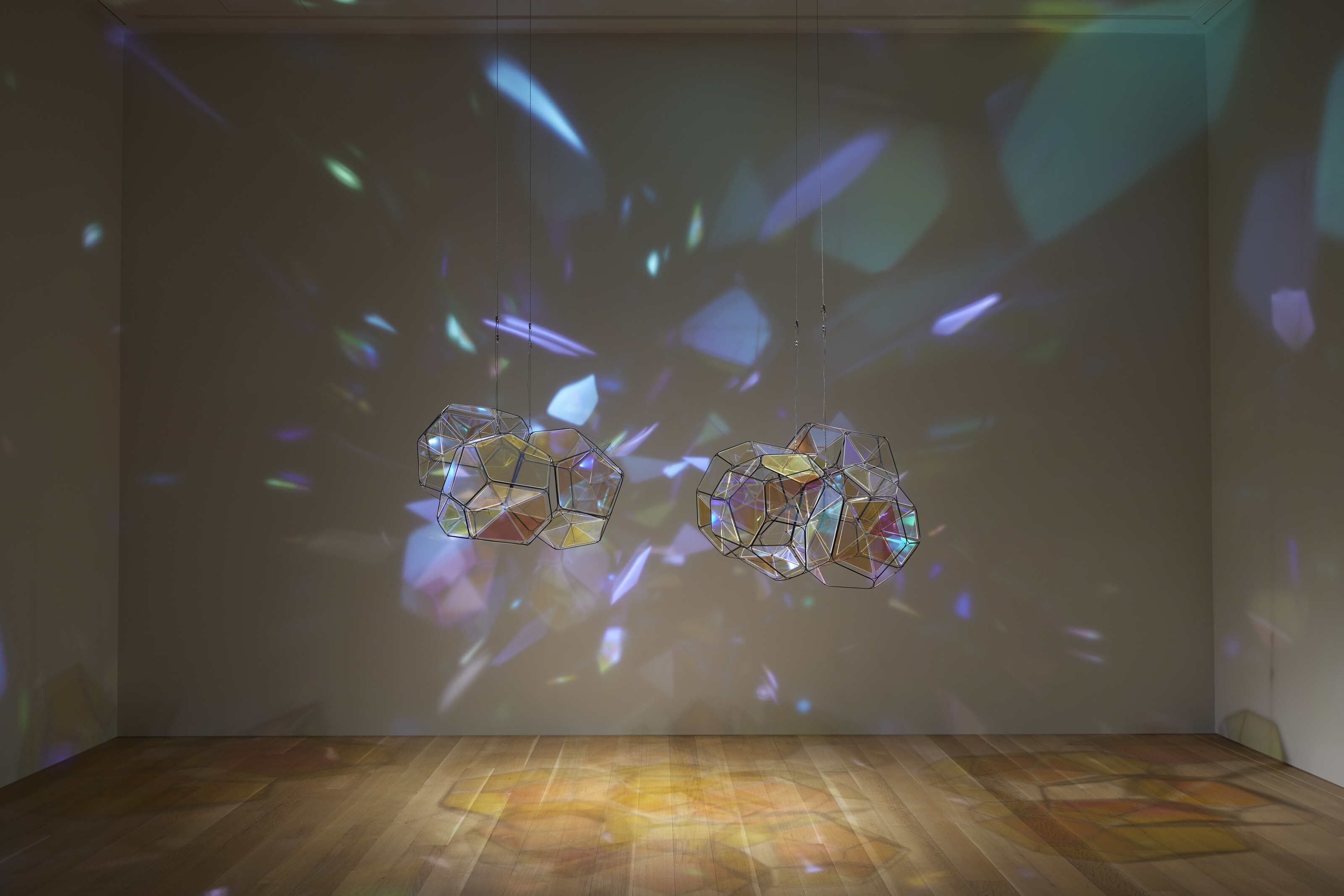 Artwork by Tomas Saraceno, GJ 581 e/M+1, Made of metal, plexiglass, monofiliment, iridescent fishing line, metal wire, carbon fiber and steel thread, in two parts