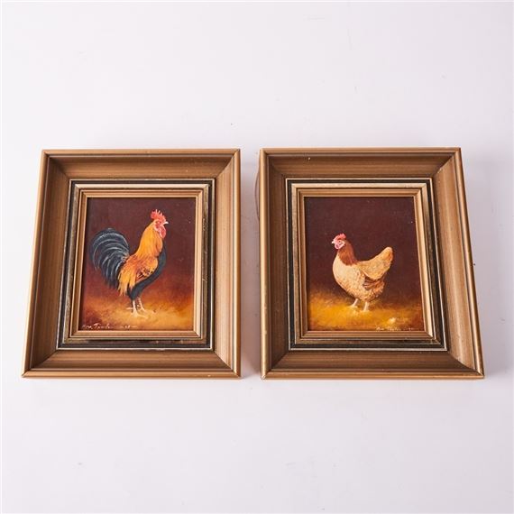 A pair of framed paintings depicting a rooster and a hen against warm backgrounds.