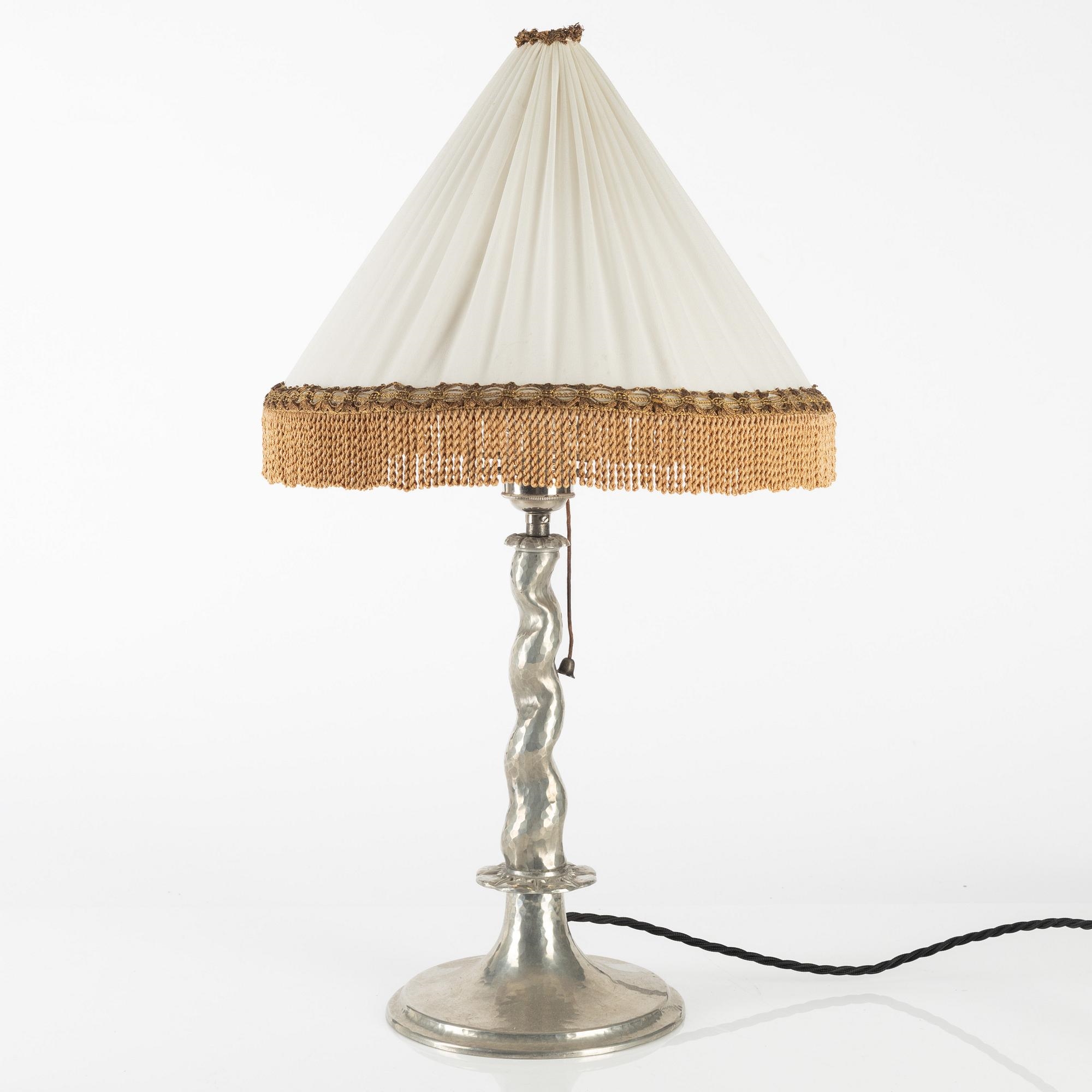 Artwork by Harald Notini, a table lamp model "6891", Arvid Böhlmarks Lampfabrik, Stockholm 1920s, Made of glass, wood and leather