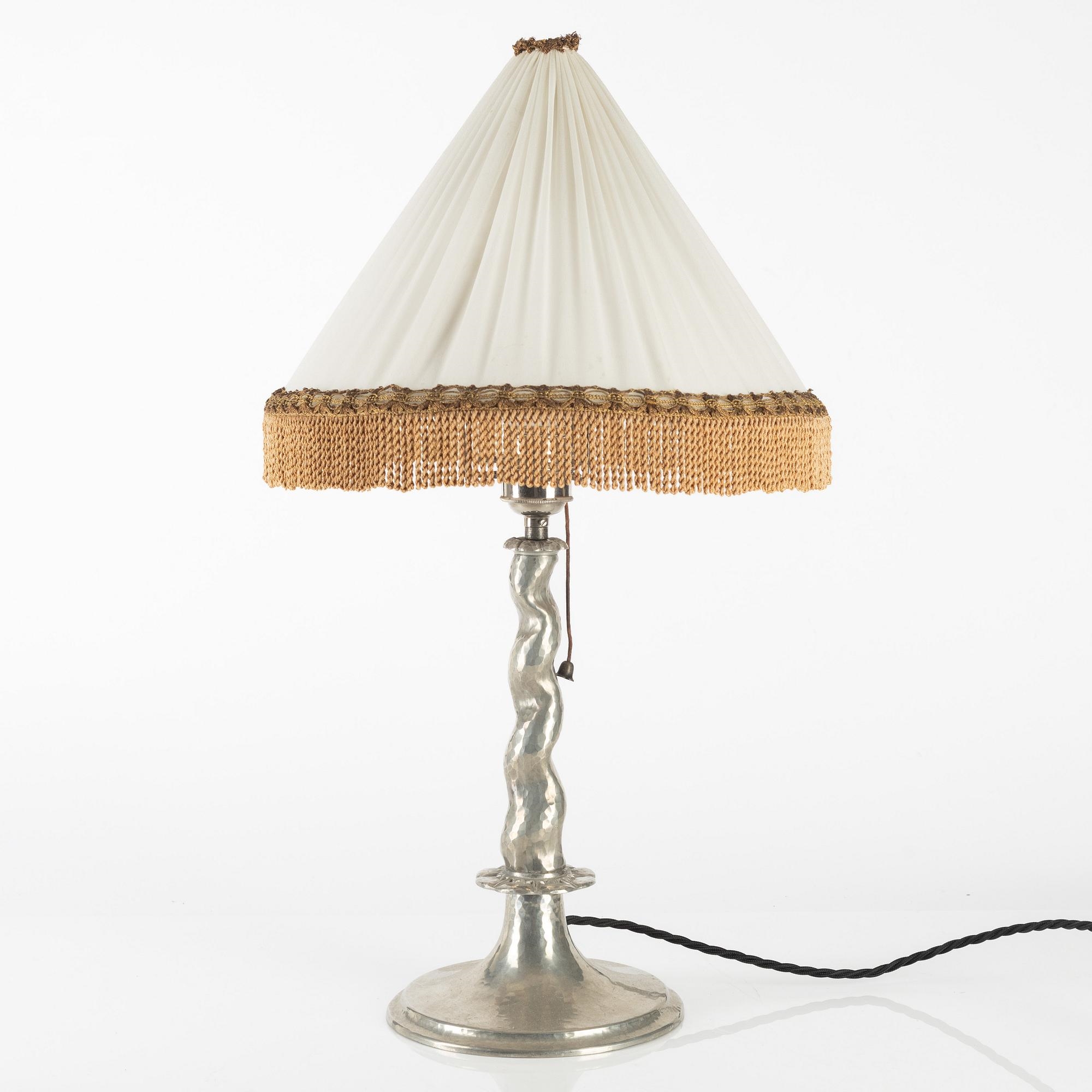 Artwork by Harald Notini, a table lamp model "6891", Arvid Böhlmarks Lampfabrik, Stockholm 1920s, Made of glass, wood and leather