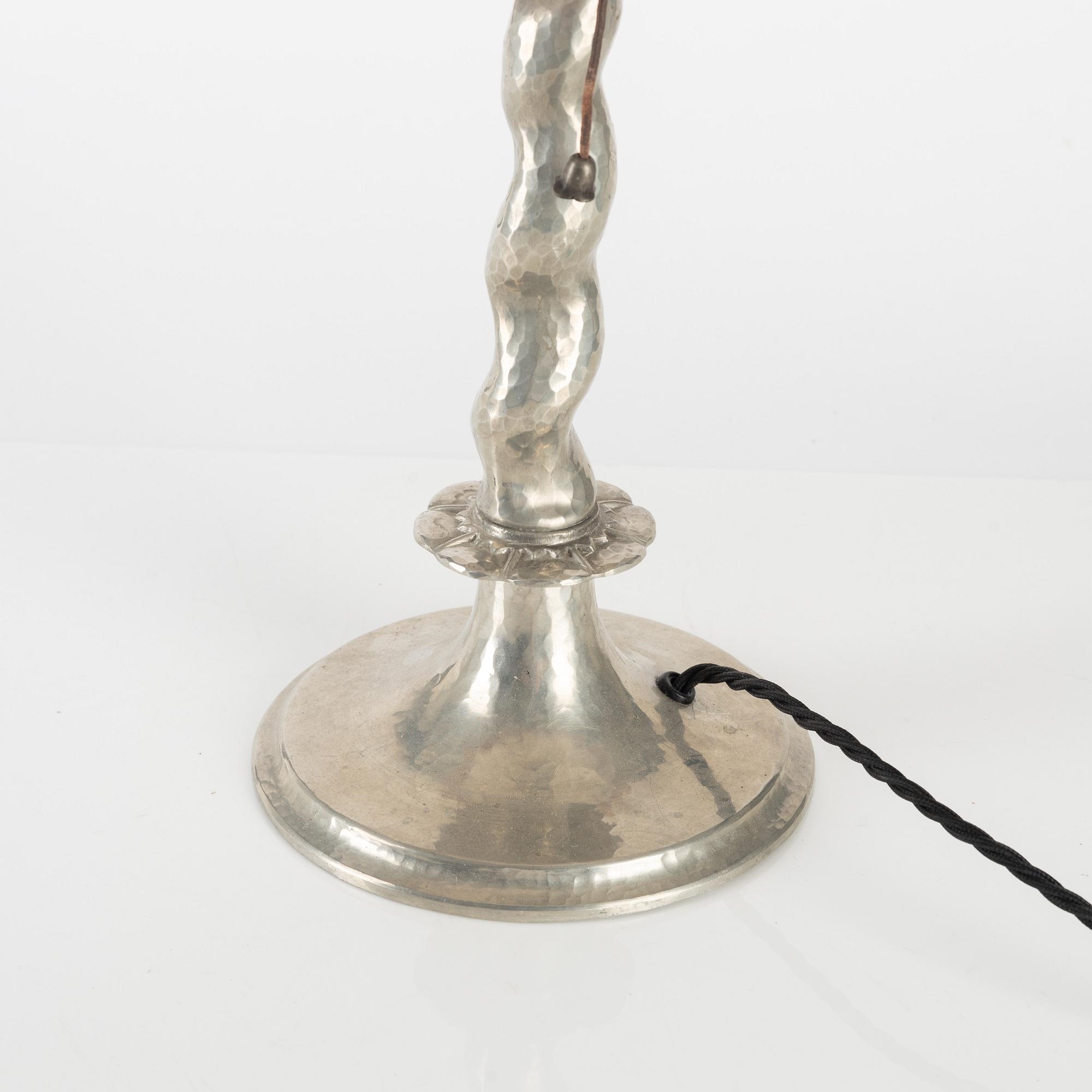 Artwork by Harald Notini, a table lamp model "6891", Arvid Böhlmarks Lampfabrik, Stockholm 1920s, Made of glass, wood and leather