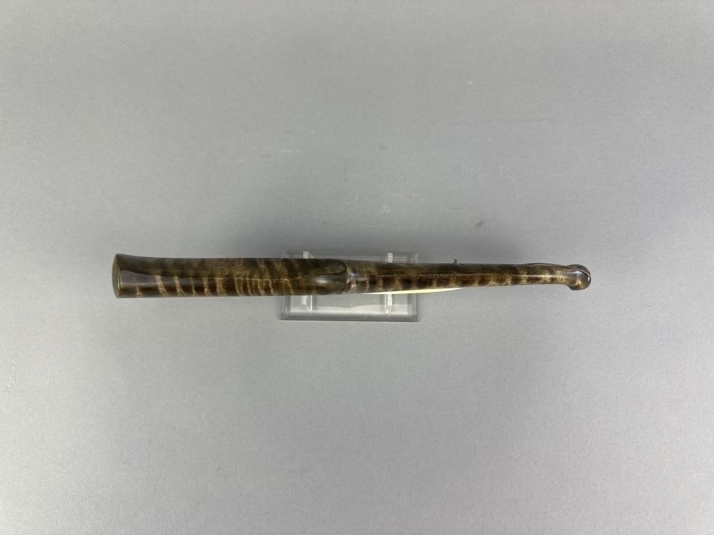 Artwork by Sonny Bashore, Hand Carved Jigging Stock