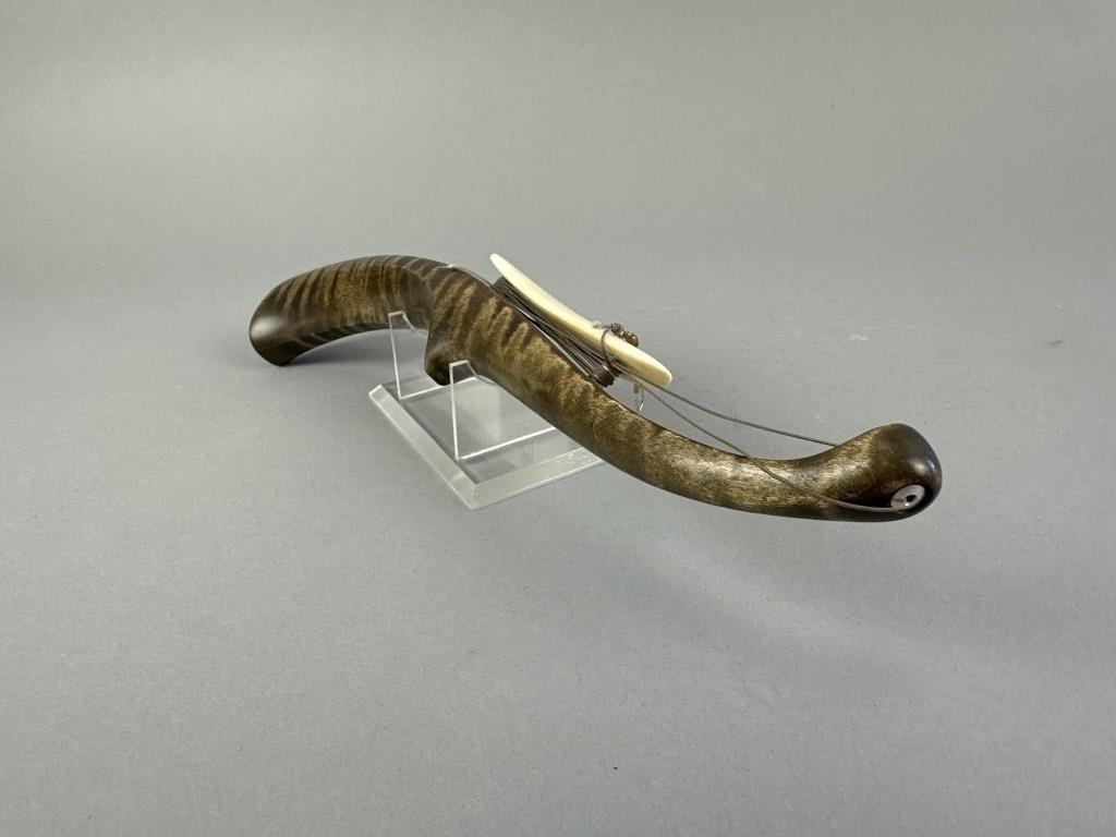 Artwork by Sonny Bashore, Hand Carved Jigging Stock