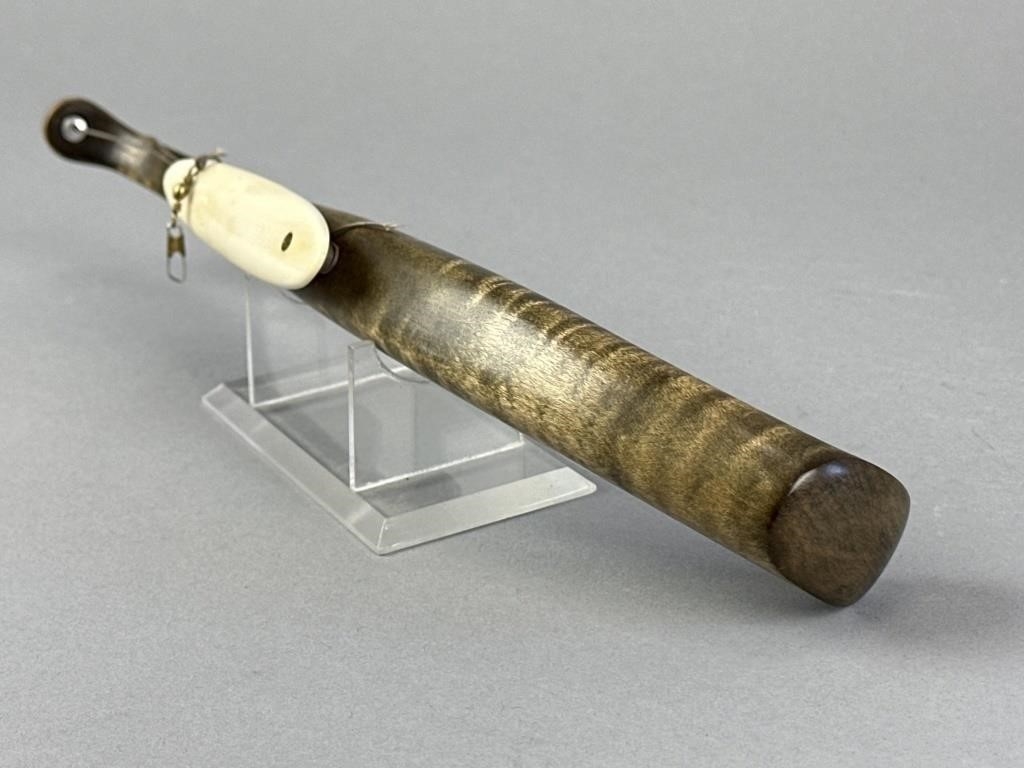 Artwork by Sonny Bashore, Hand Carved Jigging Stock