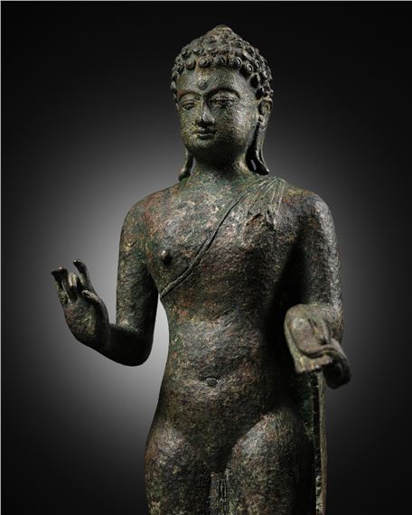 A BRONZE FIGURE OF BUDDHA, INDONESIA, 9TH