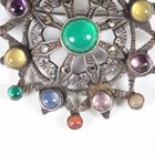 Artwork by Sybil Dunlop, An early 20th century Arts and Crafts silver and varicoloured gemstone set brooch by Sybil Dunlop, Made of silver