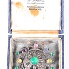 Artwork by Sybil Dunlop, An early 20th century Arts and Crafts silver and varicoloured gemstone set brooch by Sybil Dunlop, Made of silver