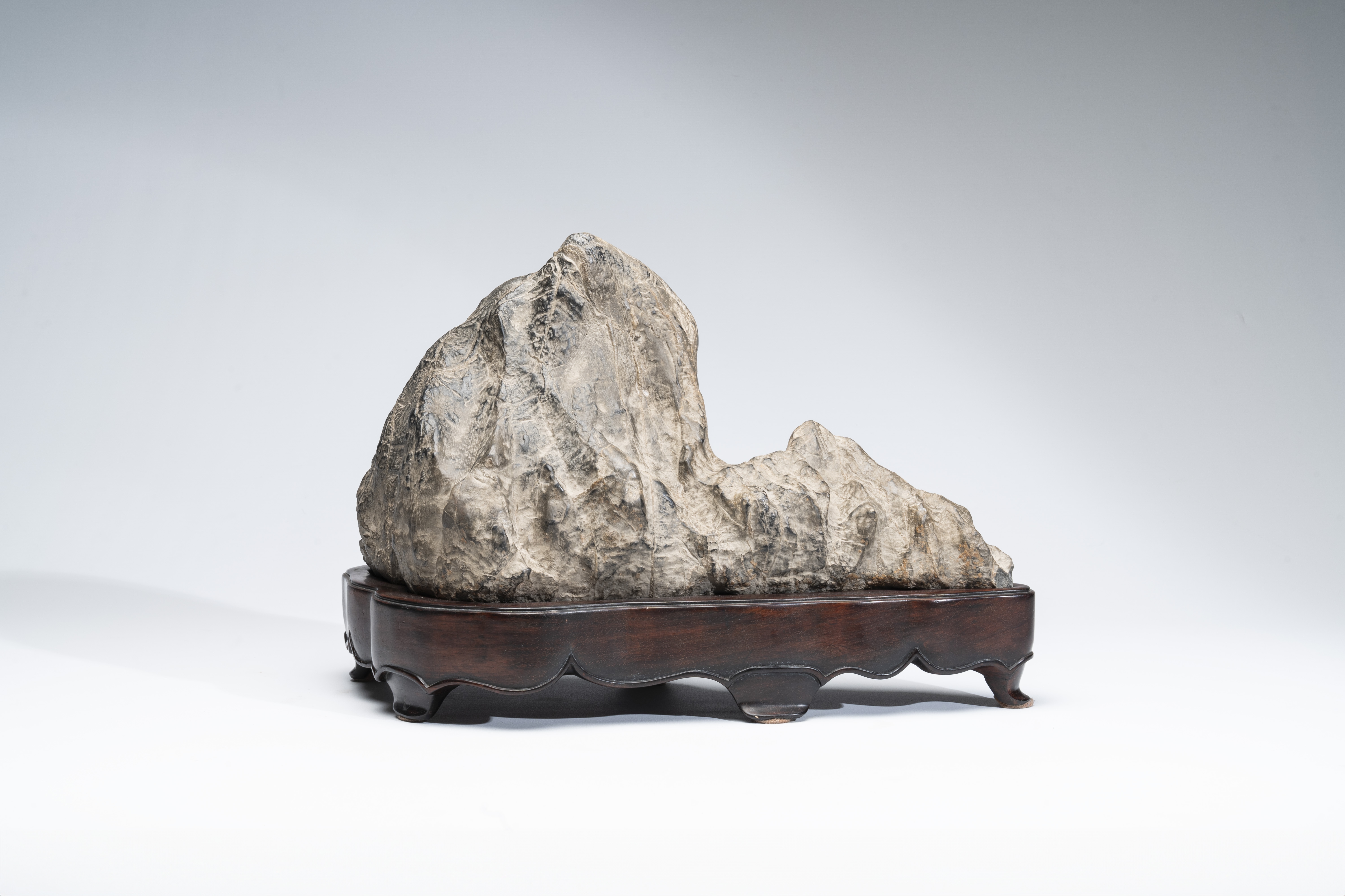 Chinese School, 20th Century | A Chinese Lingbi stone scholar's rock on ...