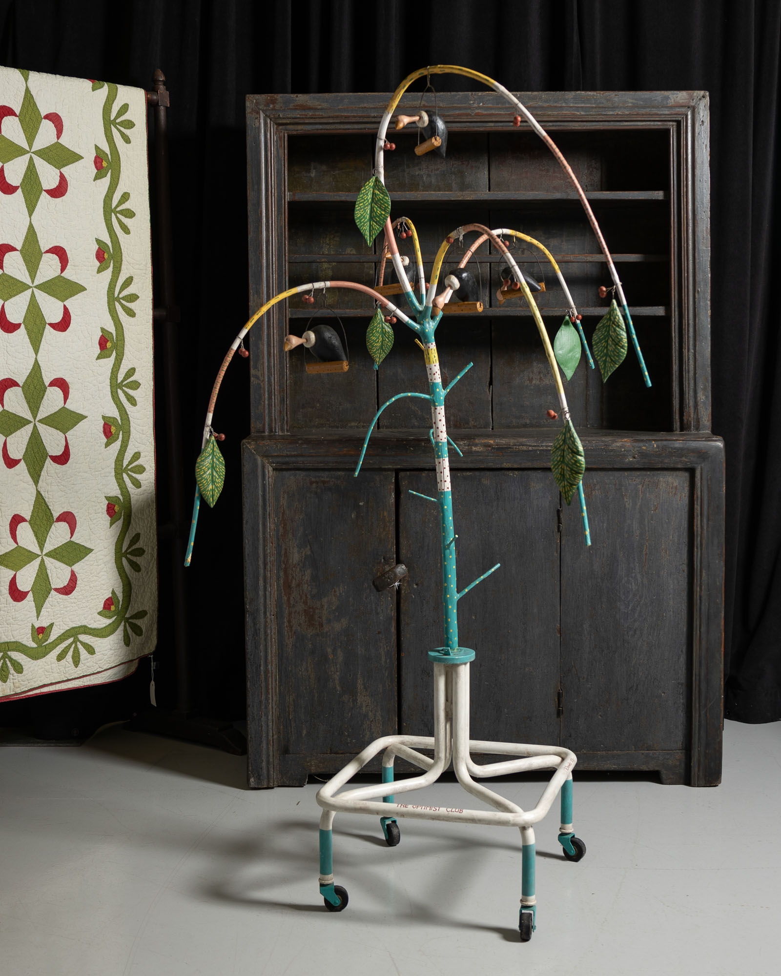 Artwork by Robert Danielis, The Optimist Club, Made of painted wood and metal on a found metal