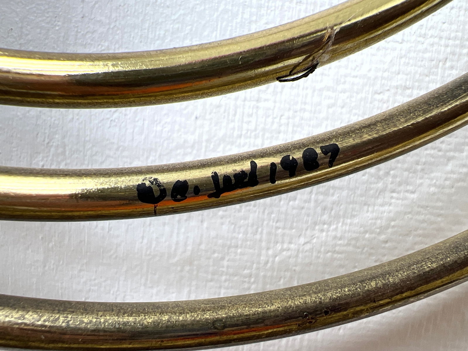 Curtis Jeré | Curved spray of brass rods around peacock head (1987 ...