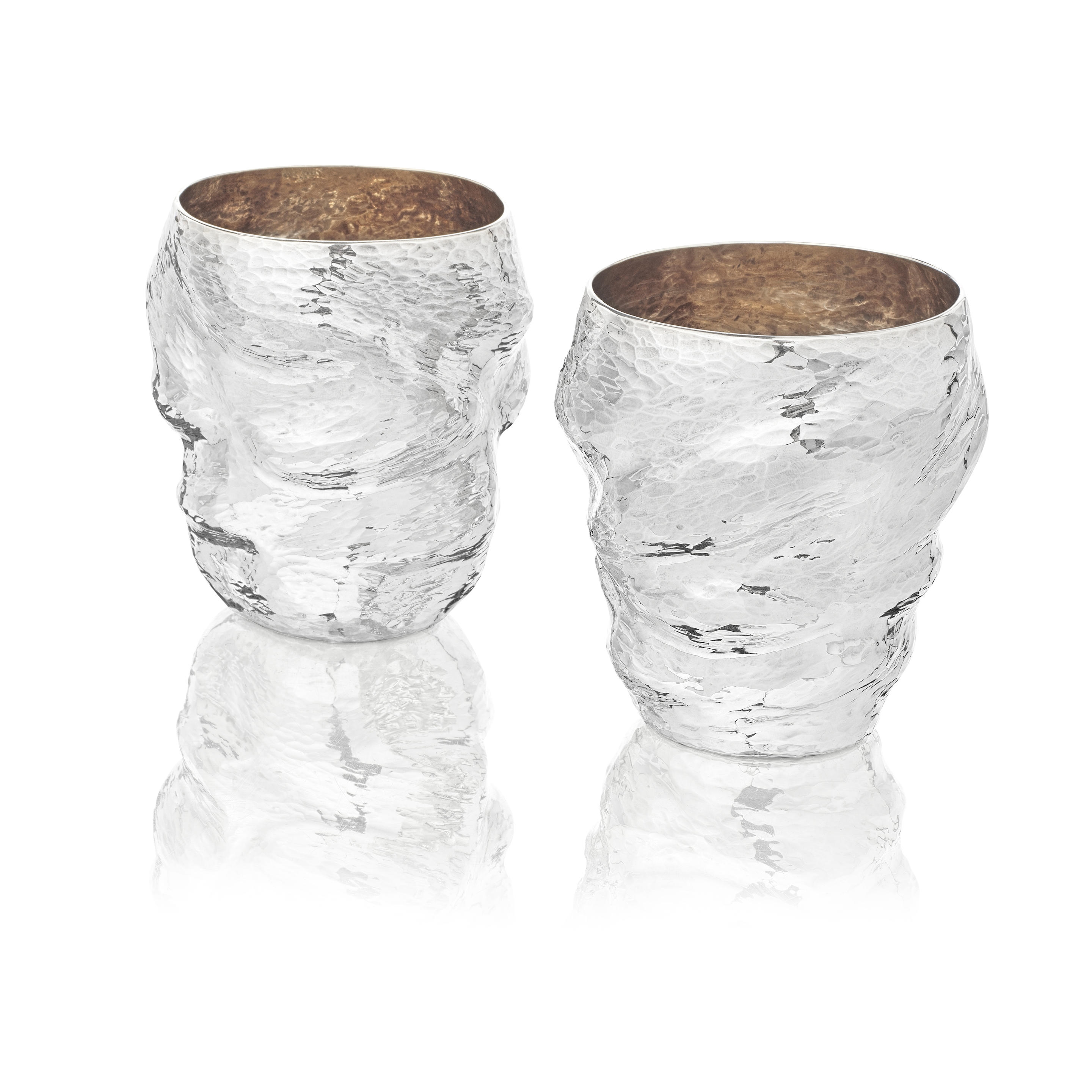 Artwork by Ndidi Ekubia, Two Elizabeth II silver beakers, Made of silver