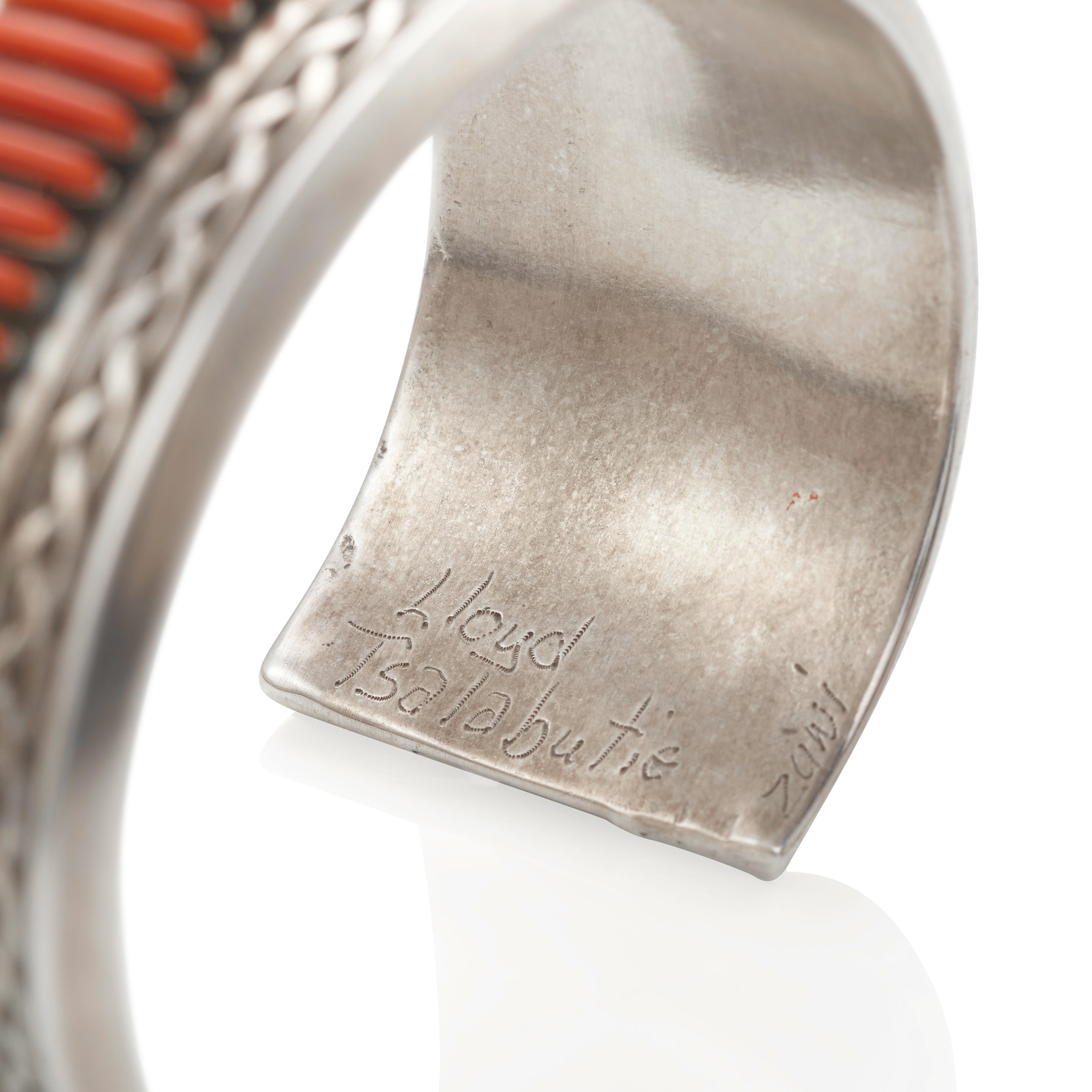 Artwork by Lloyd Tsalabutie, Cuff bracelet, Made of silver and multi-stone, coral, turquoise