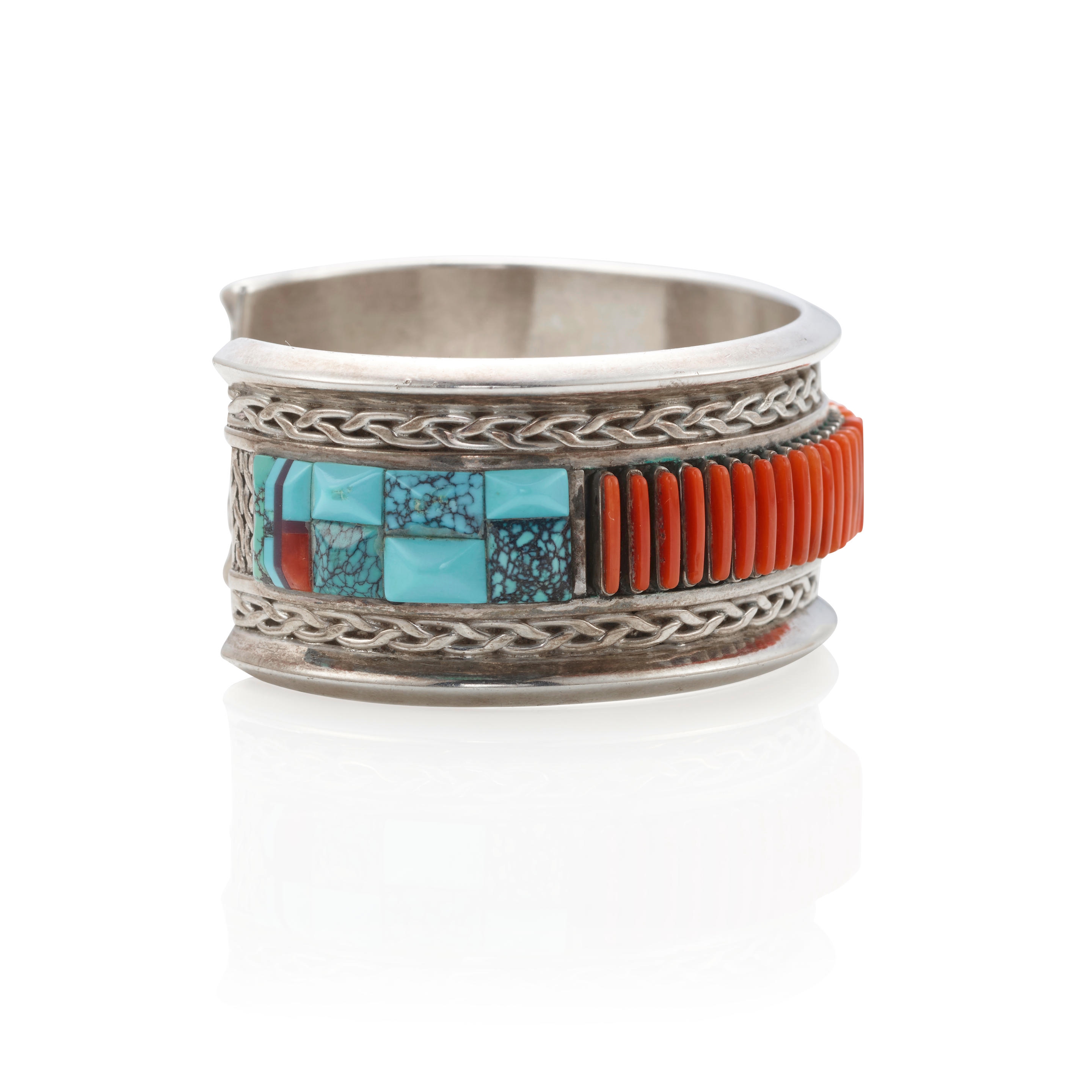 Artwork by Lloyd Tsalabutie, Cuff bracelet, Made of silver and multi-stone, coral, turquoise