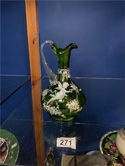 MARY GREGORY ETCHED GREEN GLASS EWER DECORATED WITH A CHERUB AND FLOWERS; 21CM by Mary Gregory