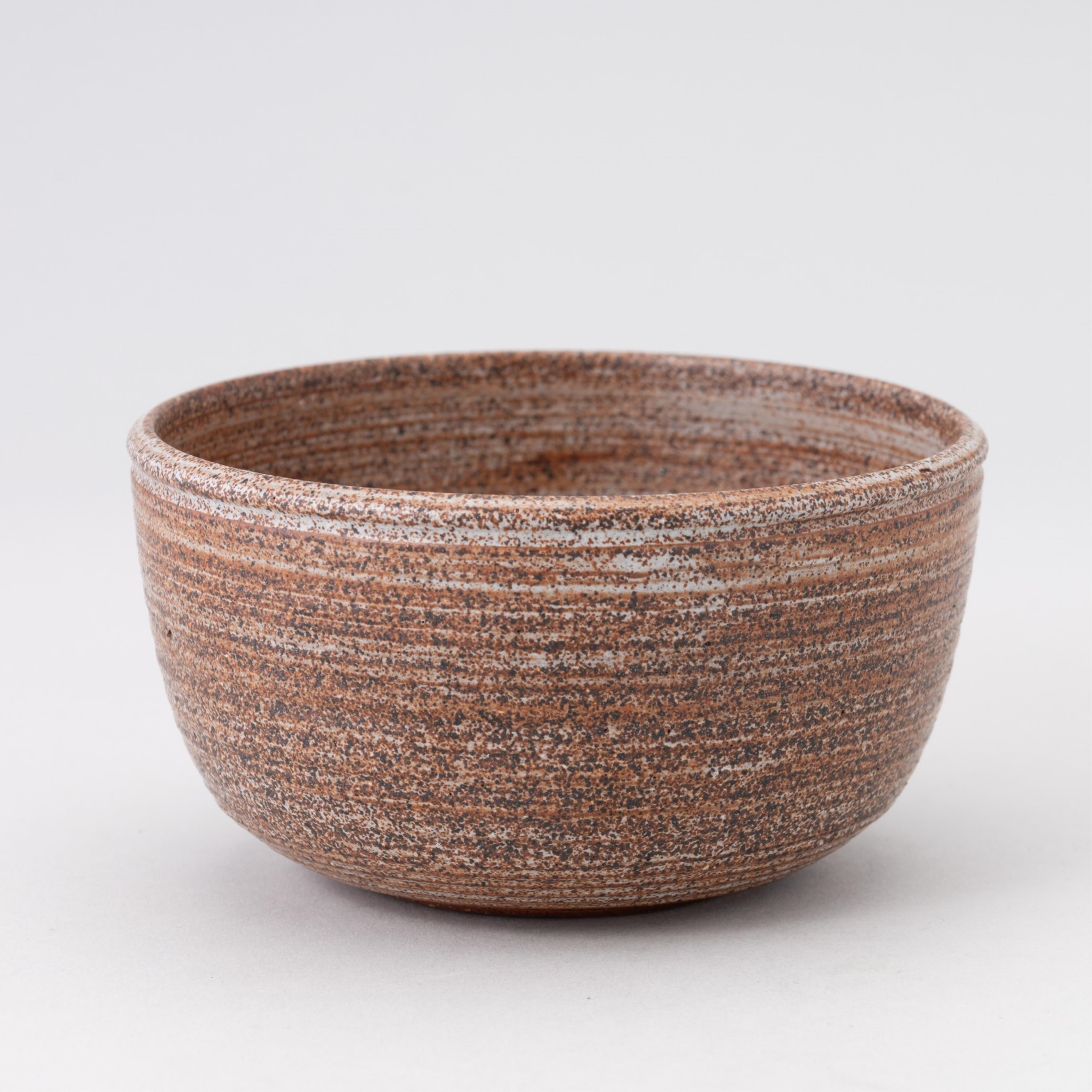 Artwork by Rex Mason, two ceramic sgraffito bowls, together with two orange glazed ceramic bowls, all signed, Made of orange glazed ceramic