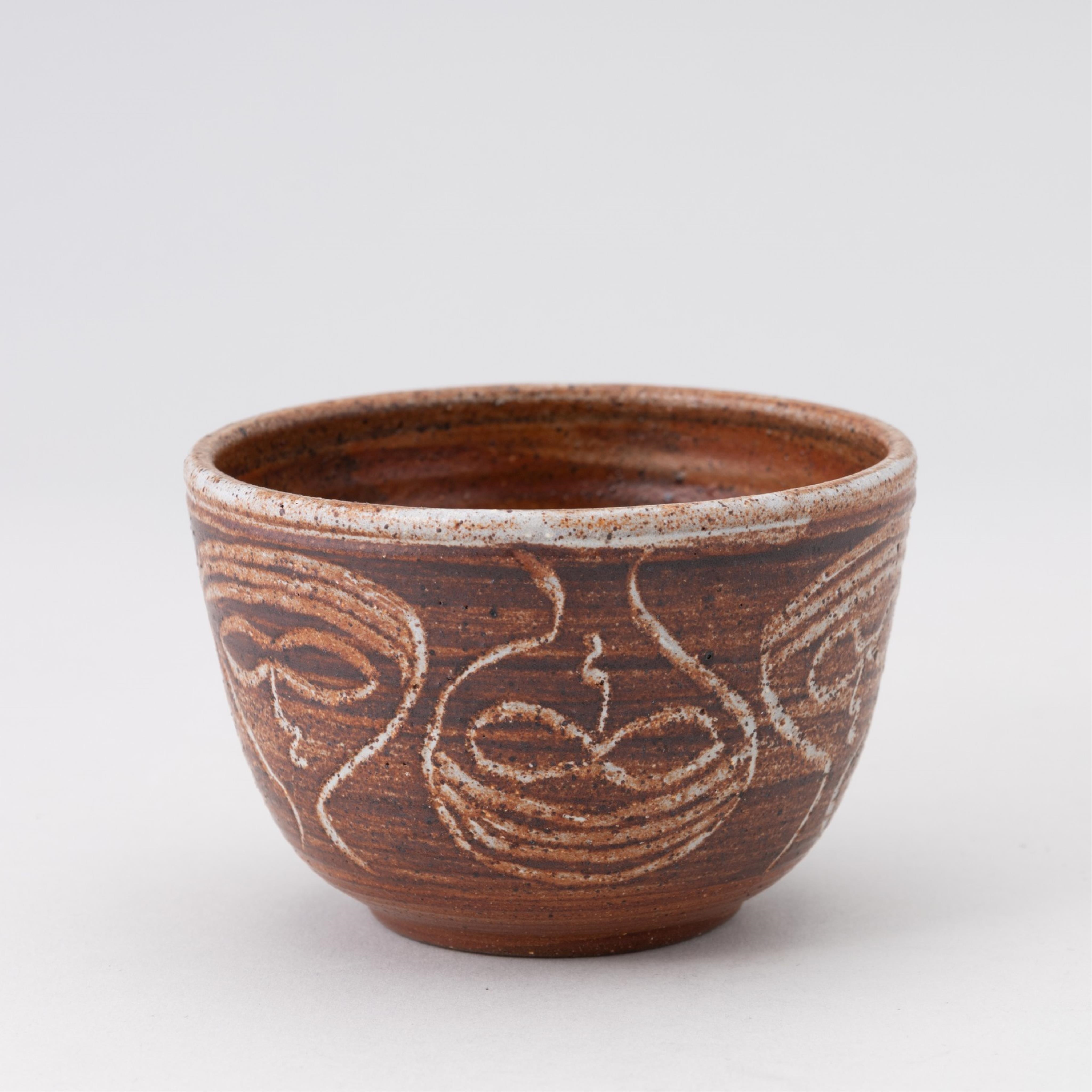 Artwork by Rex Mason, two ceramic sgraffito bowls, together with two orange glazed ceramic bowls, all signed, Made of orange glazed ceramic