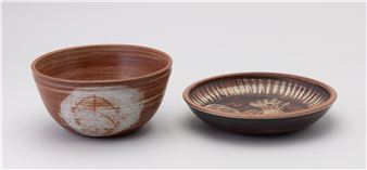 a ceramic sgraffito plate depicting a rooster, together with an orange glazed ceramic bowl, both signed - Rex Mason