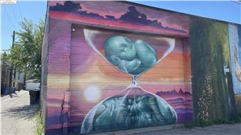 Murals on Logan Square Garage Might Slow Your Alley Shortcut