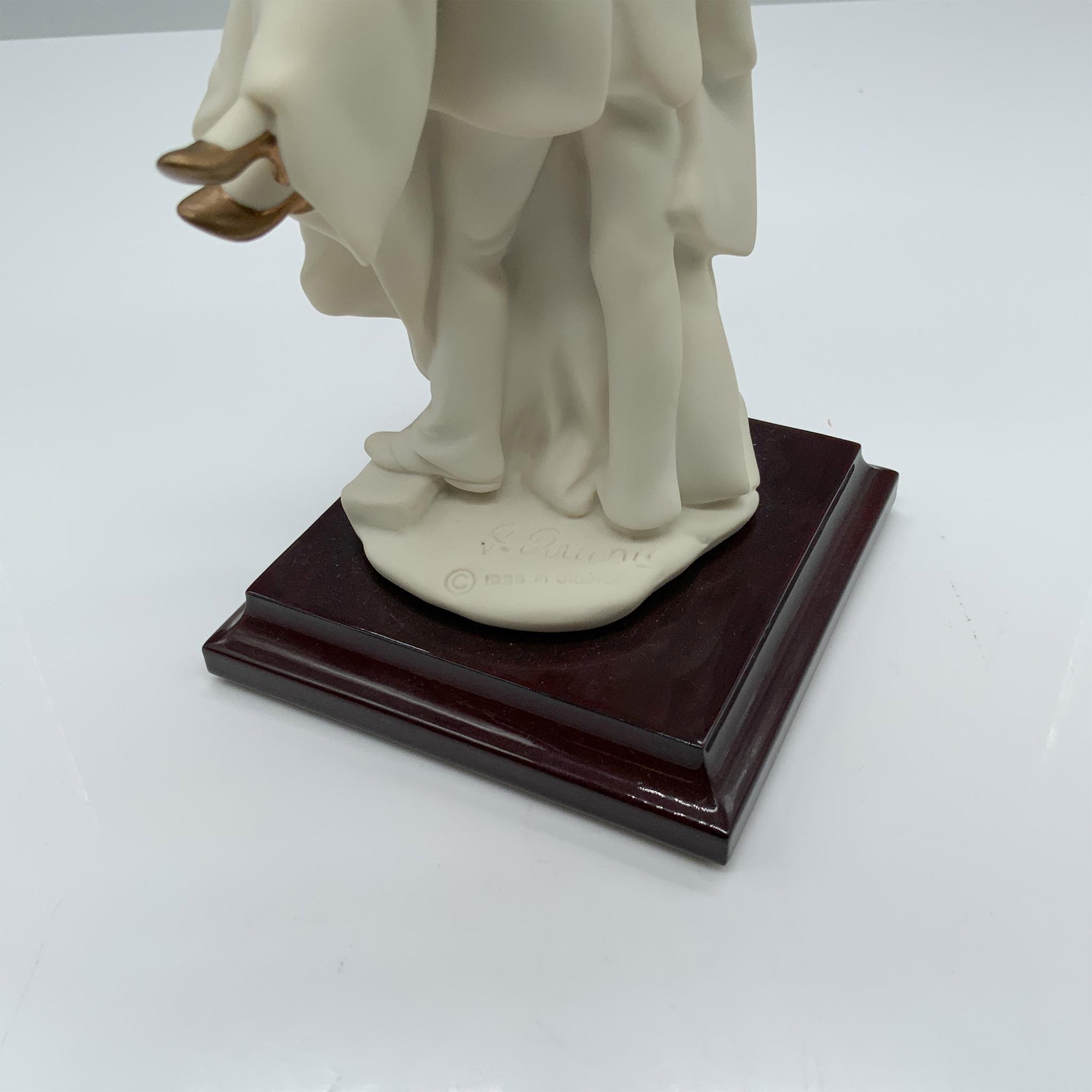 Artwork by Giuseppe Armani, Fine crafted resin with white matte finish captures a young couple celebrating their recent marriage, Made of resin with white matte