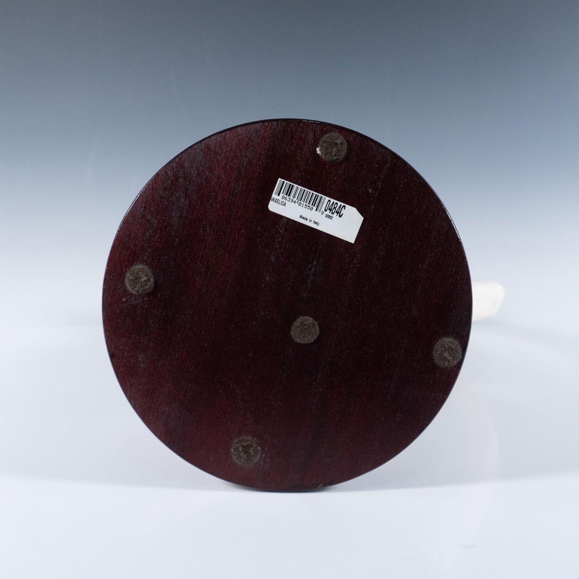 Artwork by Giuseppe Armani, Resin sculpture of a graceful woman playing a large lyre, Made of Resin sculpture