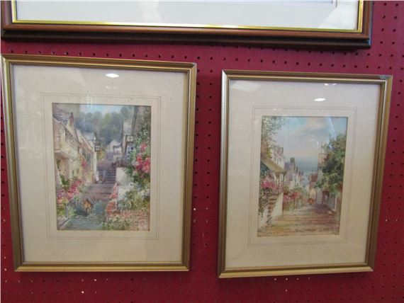 A pair of framed and , scenes of Clovelly High Street - Edward William Trick