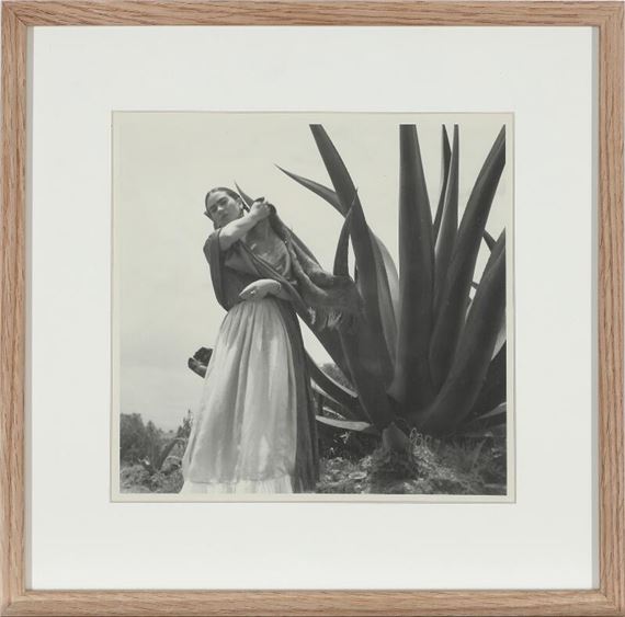 Toni Frissell | Senoras of Mexico. Frida Kahlo (Senora Diego Rivera)  Standing Next to an Agave Plant (1954) | MutualArt