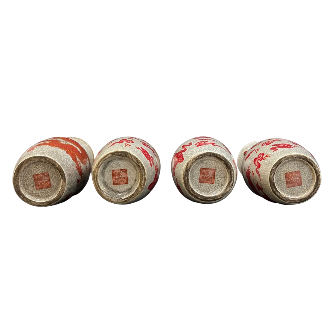 Qianlong | FOUR PIECES OF IRON RED GILT VASES | MutualArt