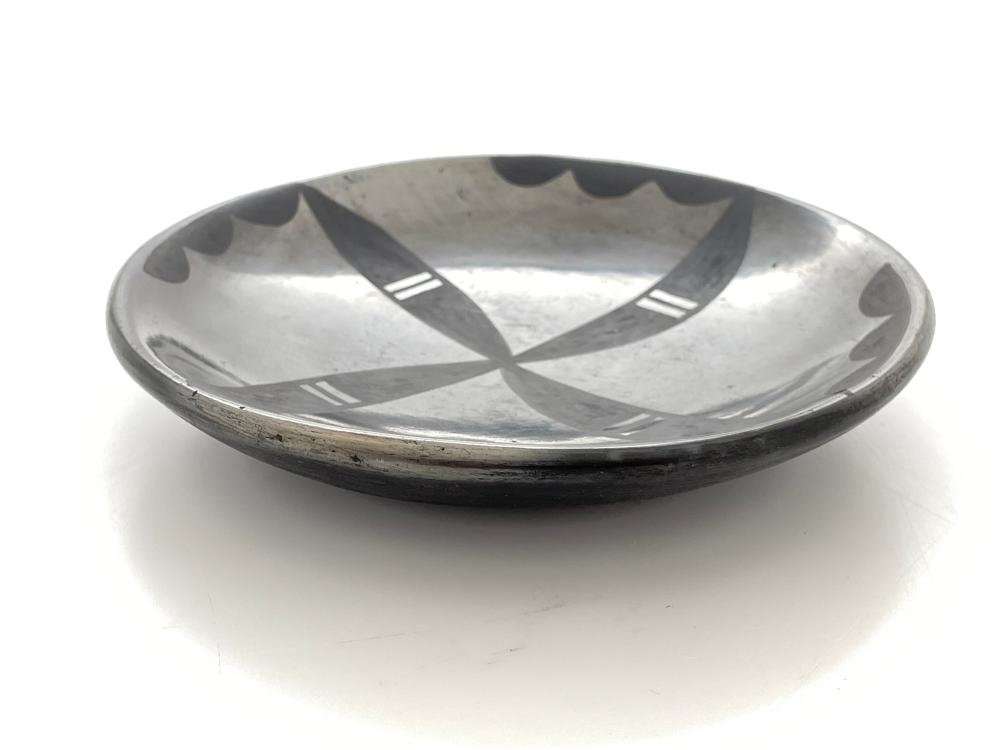 Artwork by Maria Montoya Martinez, Santana Roybal Martinez, MARIA MARTINEZ & SANTANA MARTINEZ SAN ILDEFONSO PUEBLO GUNMETAL PLATE, Made of black on black pottery