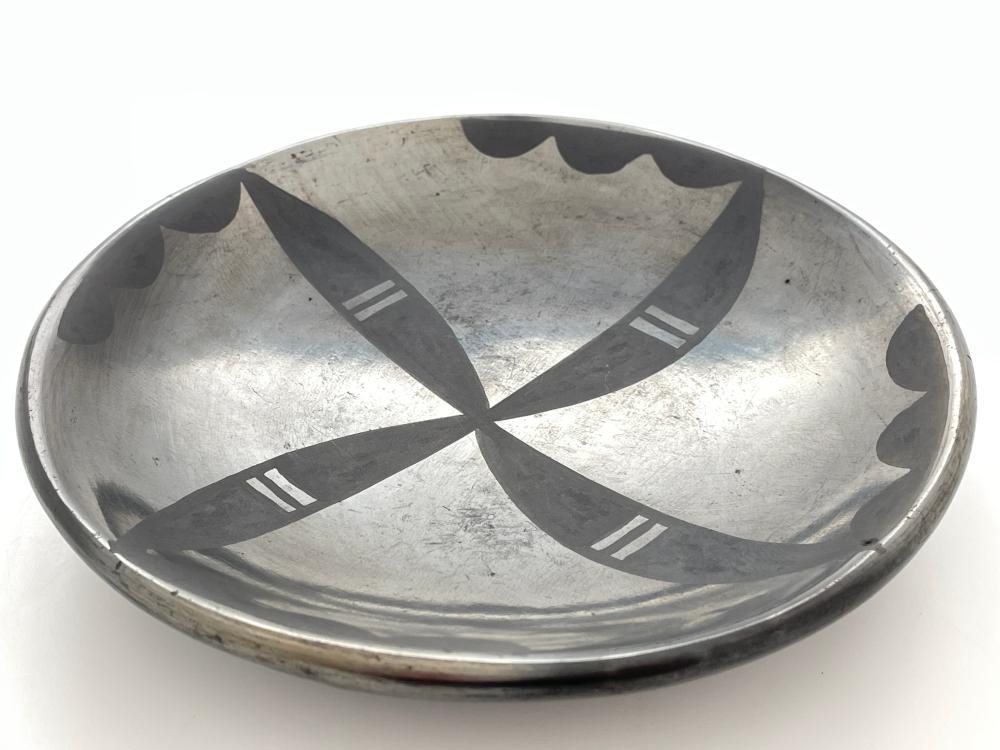 Artwork by Maria Montoya Martinez, Santana Roybal Martinez, MARIA MARTINEZ & SANTANA MARTINEZ SAN ILDEFONSO PUEBLO GUNMETAL PLATE, Made of black on black pottery
