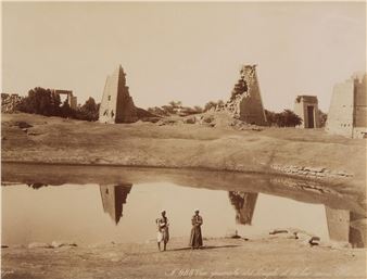 Late 19th to early 20th century albumen photograph print depicting the Karnak Temple Complex and a pond - Adelphoi Zangaki