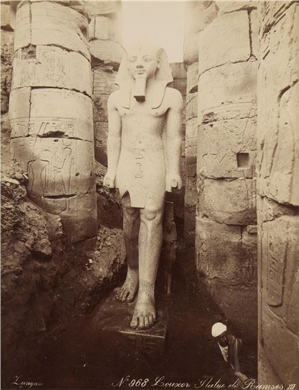 Late 19th to early 20th century albumen photograph print depicting the statue of Ramesses II at the Luxor Temple by Adelphoi Zangaki, circa 1832