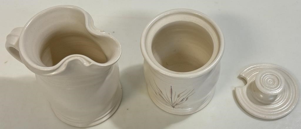 Artwork by Jack Burke, PRETTY JACK BURKE SIGNED POTTERY CREAM & SUGAR, Made of POTTERY CREAM