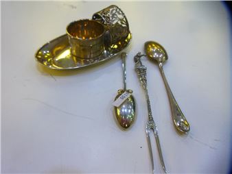 A silver lot comprising of two napkin rings, one Birmingham 1905 James Rose and Birmingham 1921 - James Rose