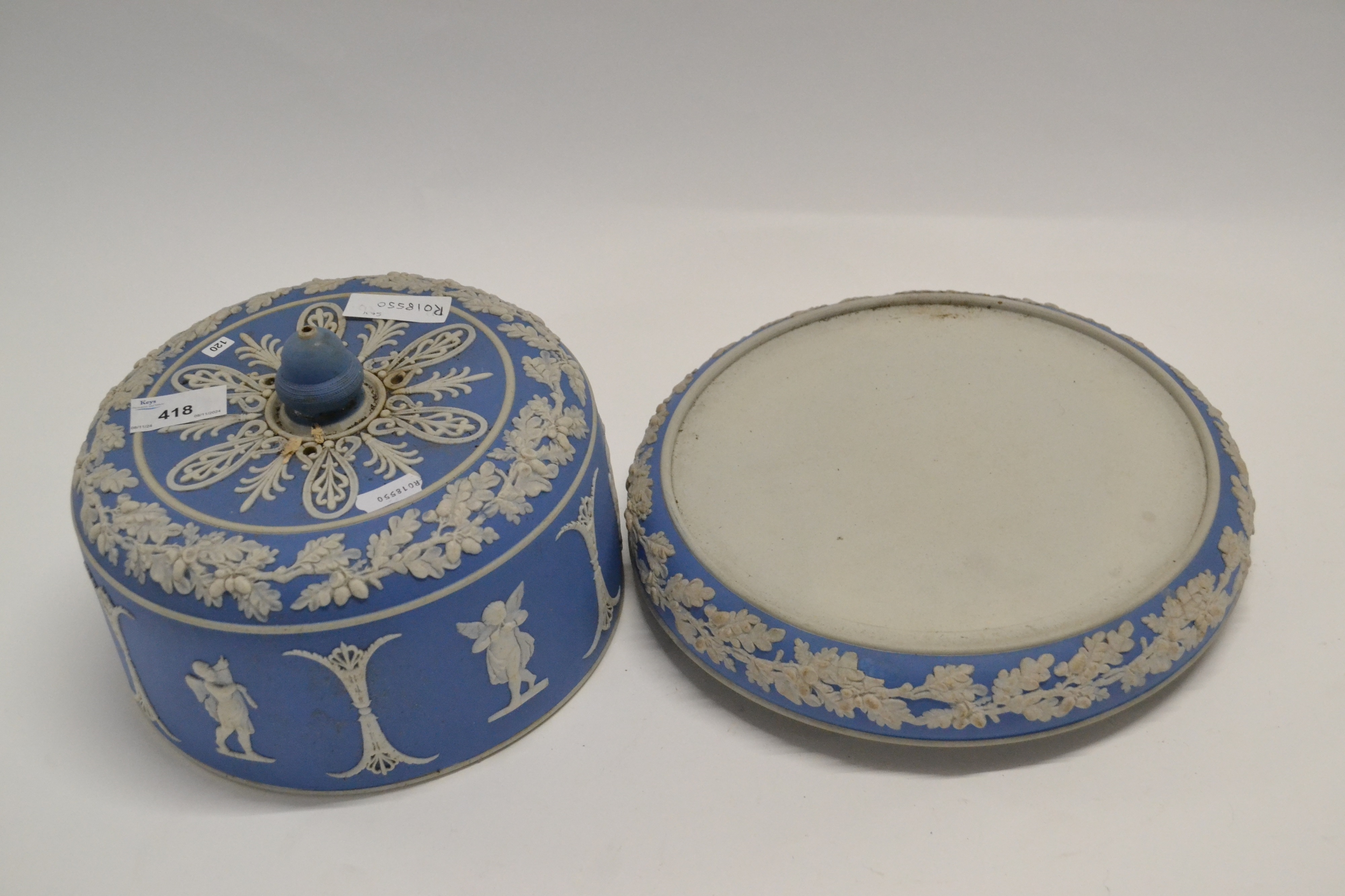 Wedgwood | A Wedgwood type blue Jasper ware cheese dish and cover with ...