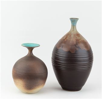 PAT HIGGINBOTHAM (1928-2010); a stoneware bottle with narrow neck covered in bronze glaze with blue - Pat Higginbotham