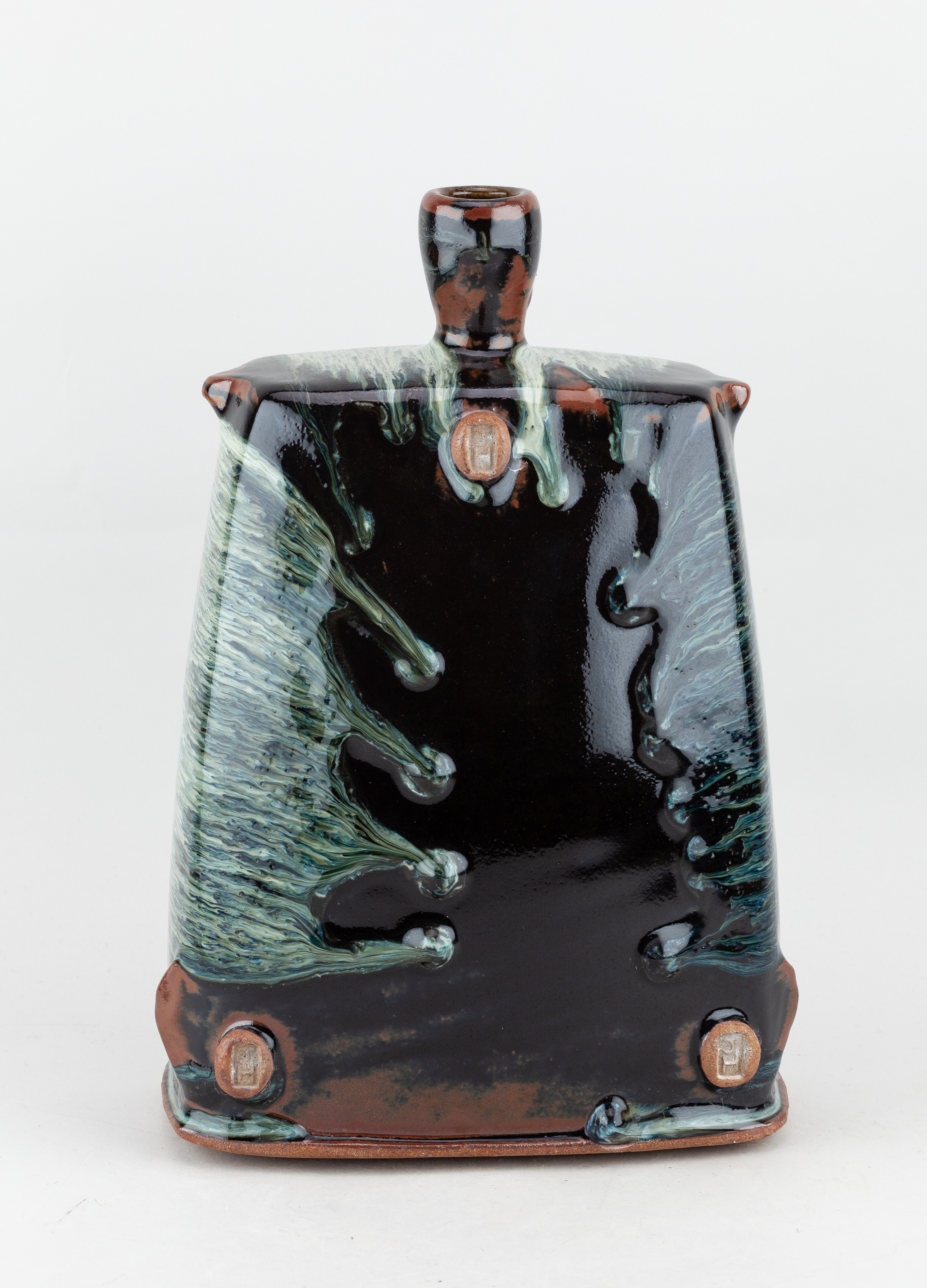 Artwork by James Hake, JAMES HAKE (born 1979); a large rectangular stoneware bottle covered in nuka and tenmoku glaze, Made of stoneware