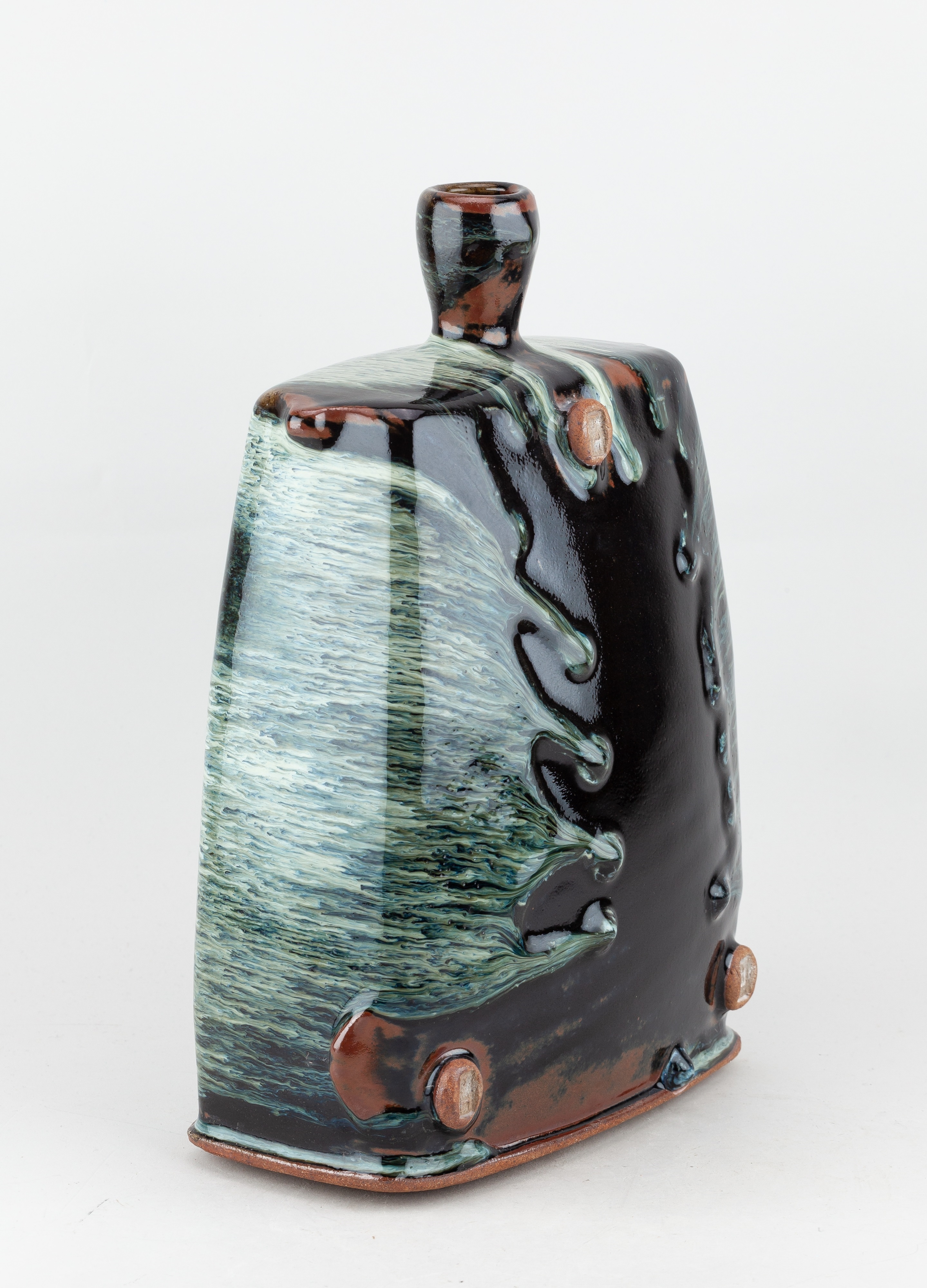 Artwork by James Hake, JAMES HAKE (born 1979); a large rectangular stoneware bottle covered in nuka and tenmoku glaze, Made of stoneware