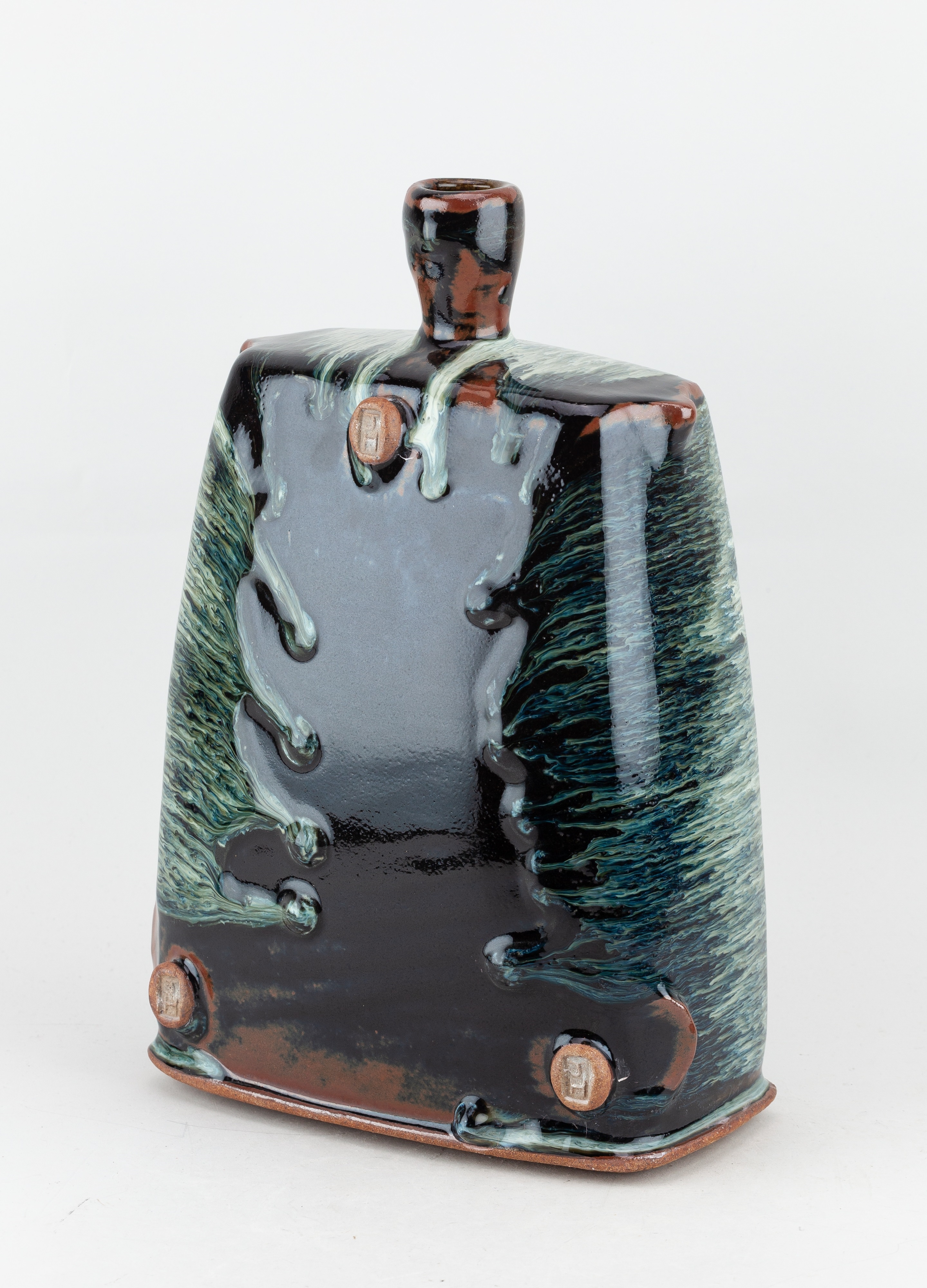 Artwork by James Hake, JAMES HAKE (born 1979); a large rectangular stoneware bottle covered in nuka and tenmoku glaze, Made of stoneware