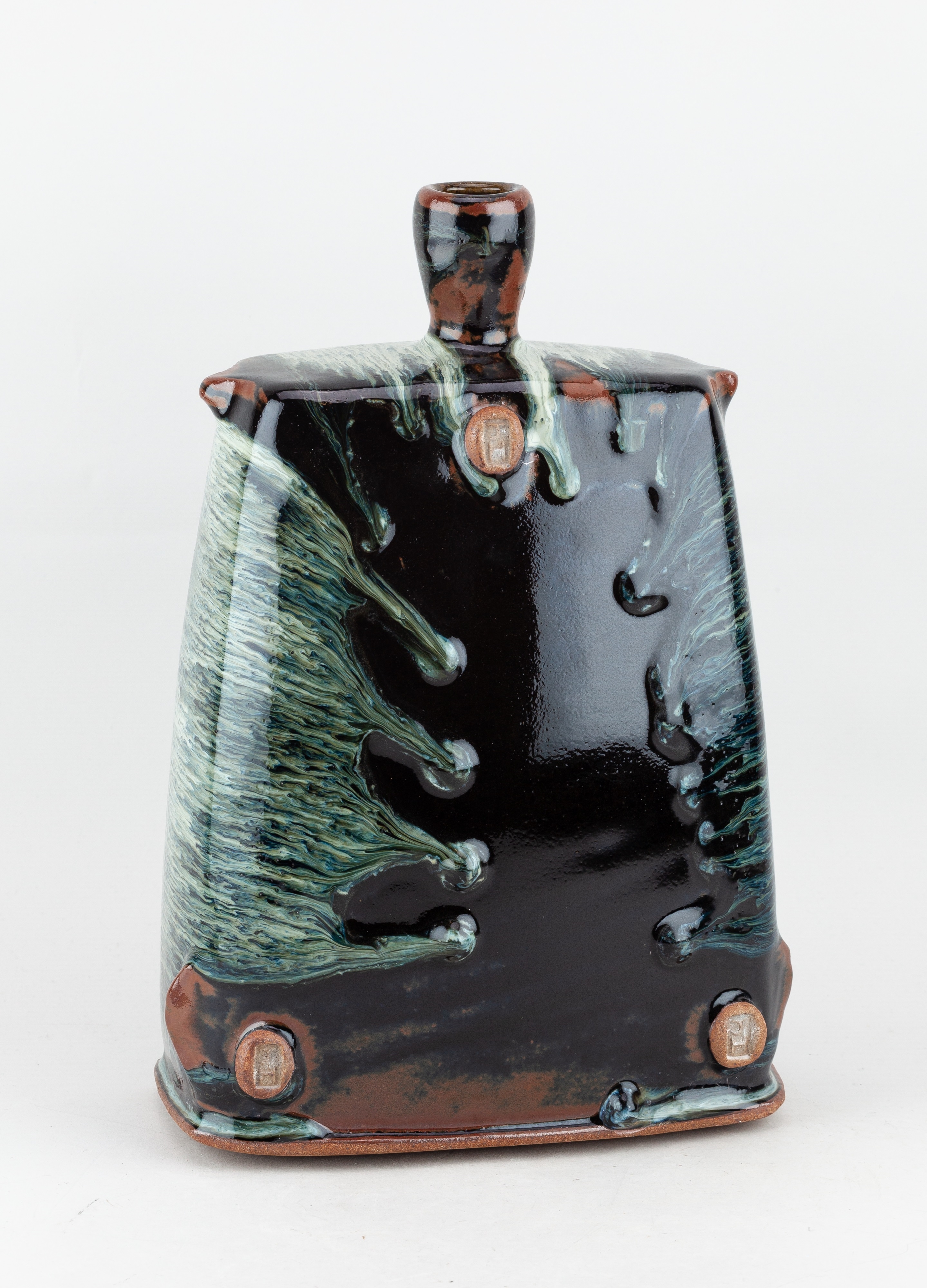 Artwork by James Hake, JAMES HAKE (born 1979); a large rectangular stoneware bottle covered in nuka and tenmoku glaze, Made of stoneware