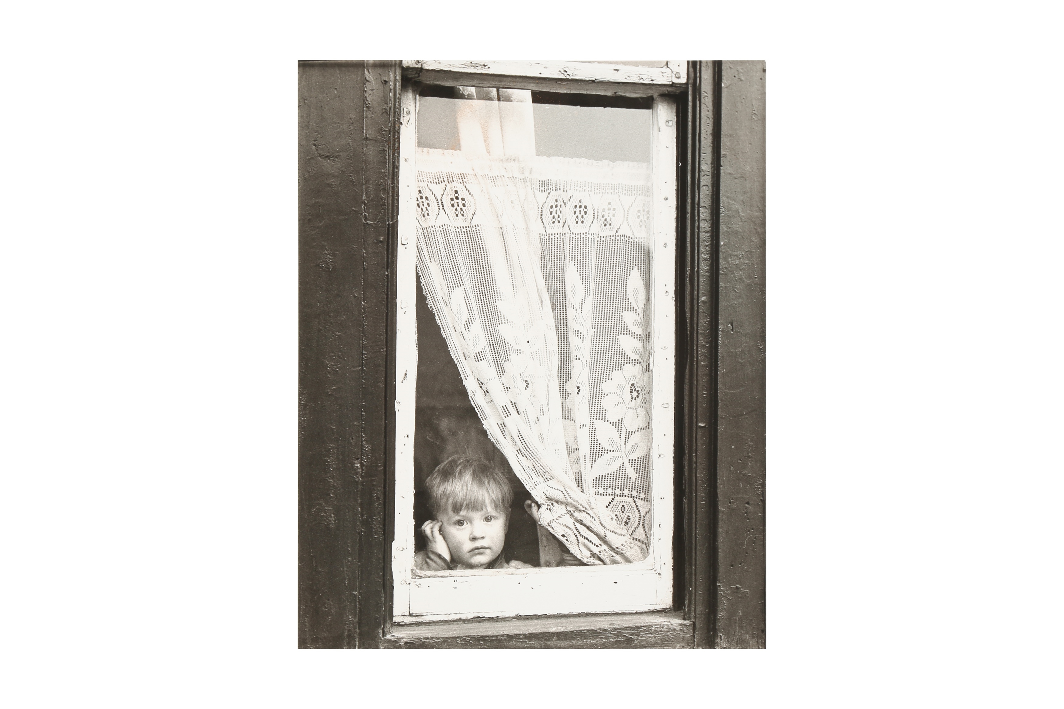 Artwork by Shirley Baker, CHILD AT A WINDOW IN SALFORD, Made of silver gelatin print