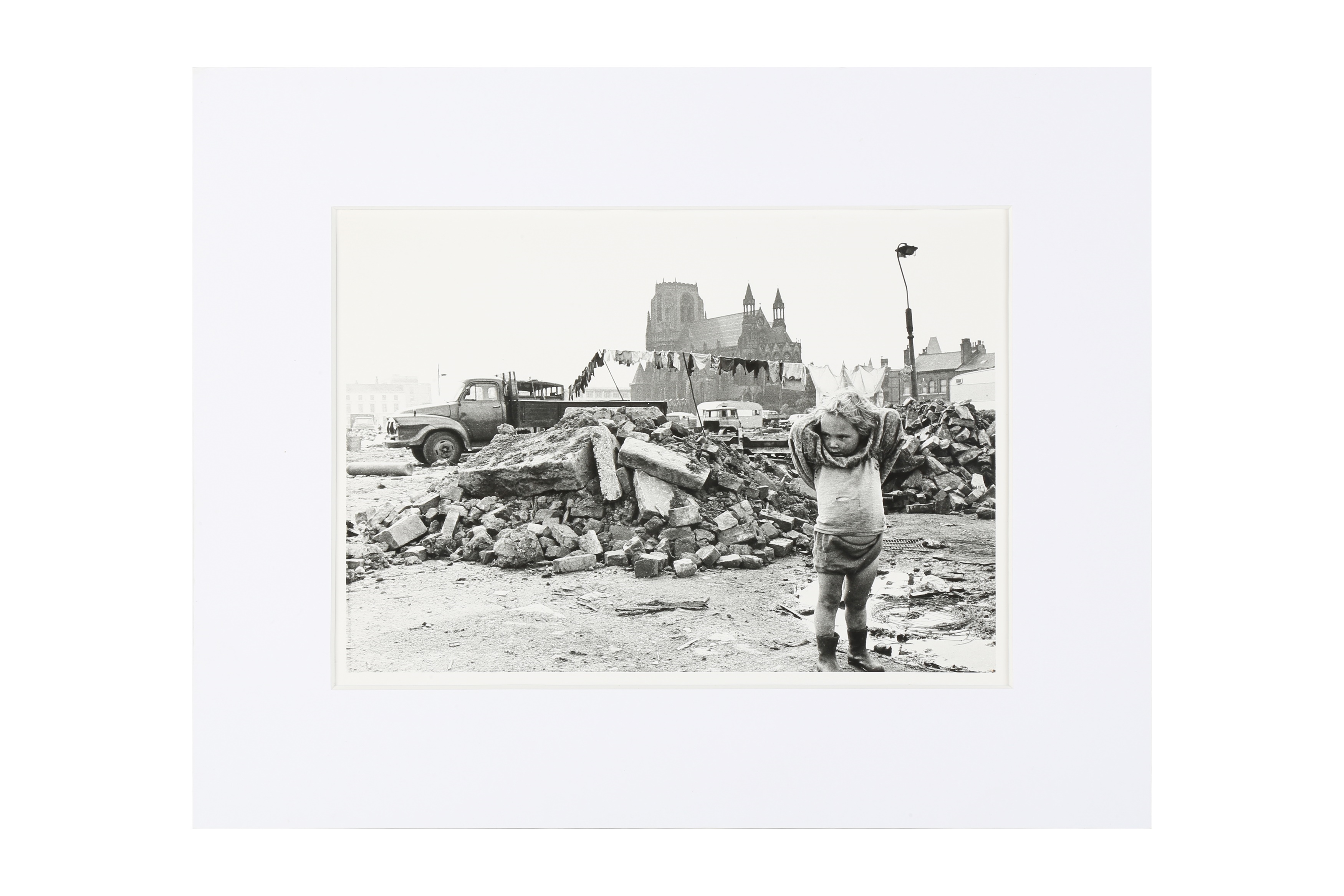 Artwork by Shirley Baker, TODDLER IN A DEMOLITION SITE, Made of silver gelatin print